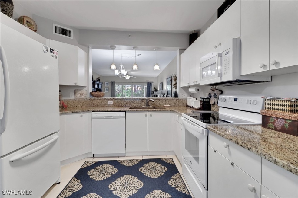 7823 Regal Heron Cir unit 105, Naples, FL 34104 - photo 1