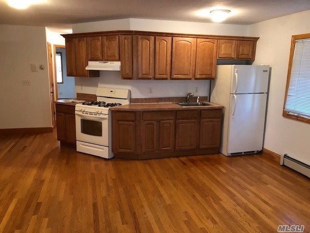 6004 172nd St unit 1st, Flushing, NY 11365 - photo 1