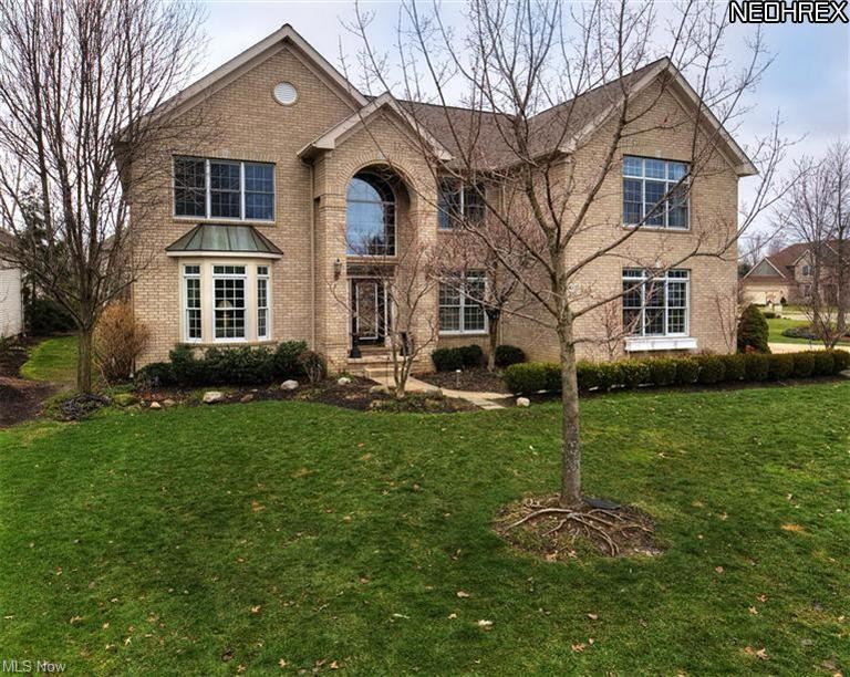 WOW!  All brick, 4,883 sq ft, three car garage, qu