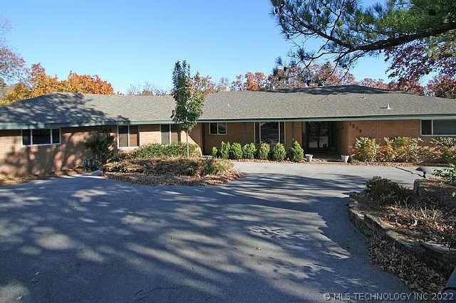 One of a kind house on treed 1.6 acres at end of p