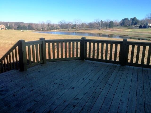 Sunrise view off of this huge, partly covered deck