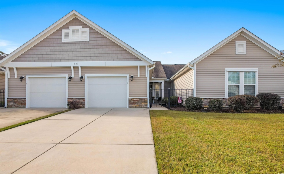 View of front of home featuring a front lawn and a