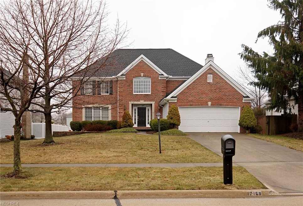 Brick front elevation with quoined corners  Front windows have metal muntin bars between the glass panels  2016 roof tear-off  March 2018 front door & casing paint.