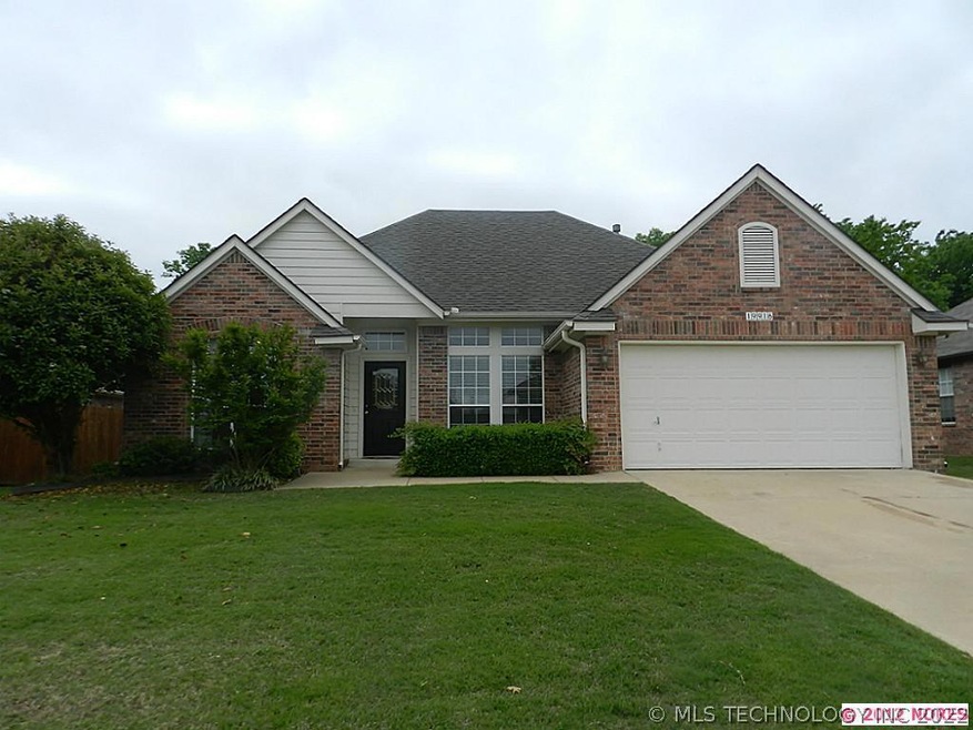 Beautiful curb appeal on this full-brick home