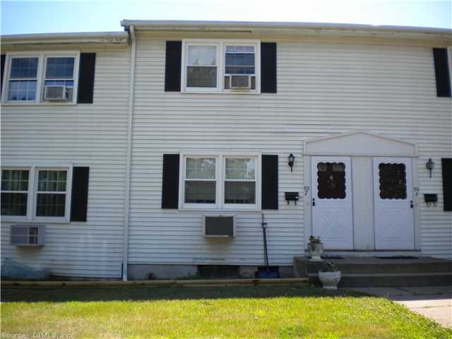 Exterior Front. Small complex. 14 Units. Outside l