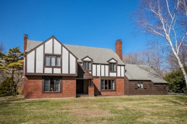 Stately Tudor on the perfect level acre.