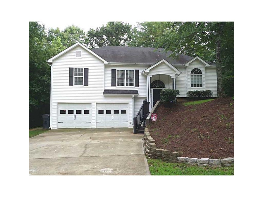 Exterior Front. 321 Paces Lakes Ridge is gorgeous 