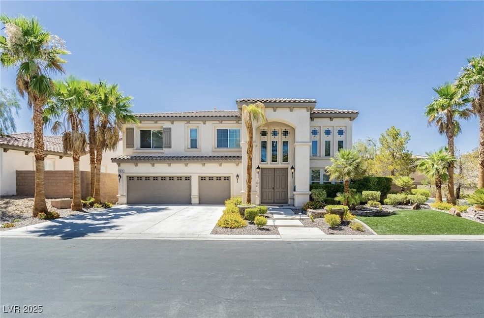 Mediterranean / spanish house featuring a garage,