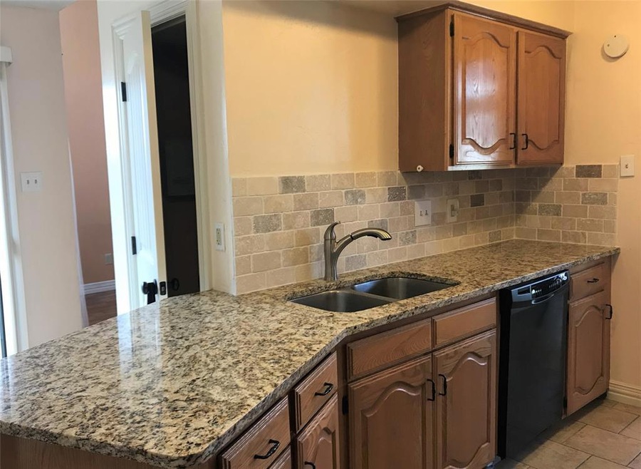 New granite countertop and backsplash