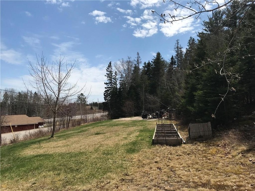Lot looking south with slabs at the...