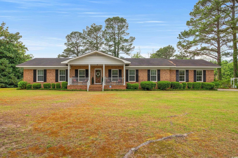 View of front of property featuring a porch, a fro