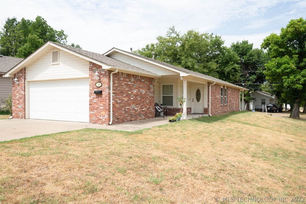 Lovely, well maintained brick home on corner lot