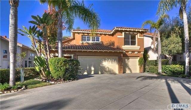 Home is set back with long driveway