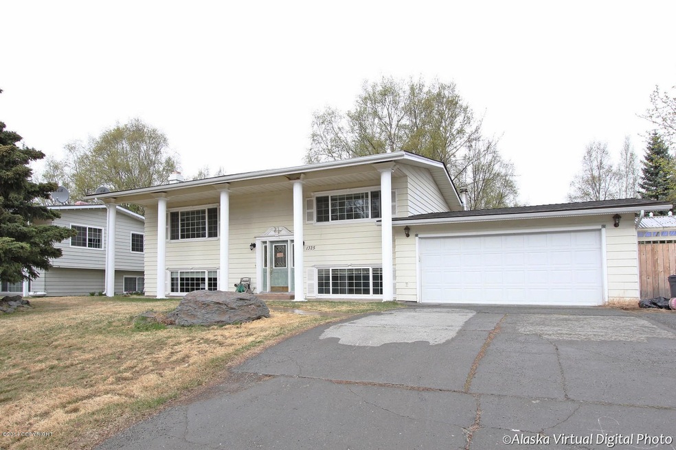 Large FrontYard with extra wide driveway