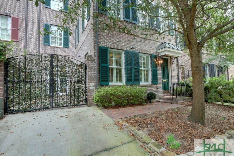 This 3 story Brick townhouse has off street parkin