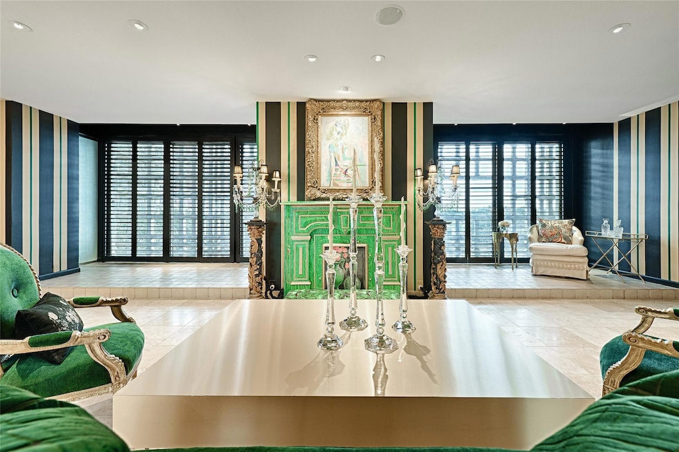 Living room facing enclosed balcony.