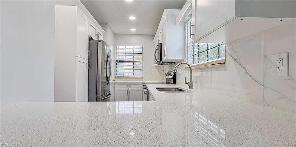 5367 Treetops Dr unit 101, Naples, FL 34113 - photo 1