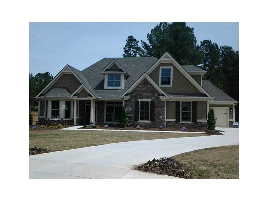 Exterior Front. The Bordeaux 3 car garage! and cov