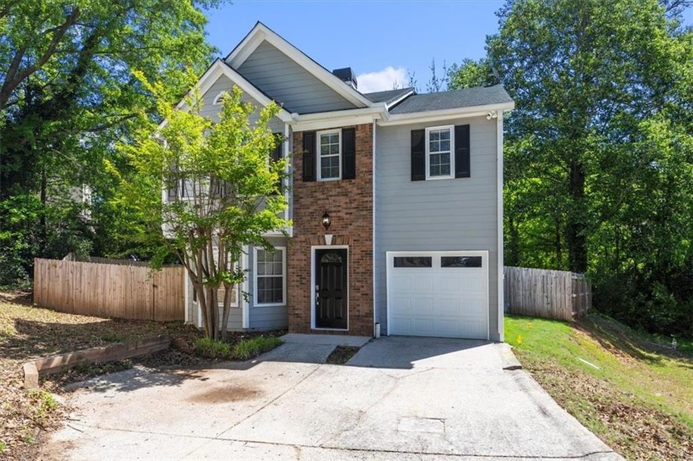 View of front of home with a garage