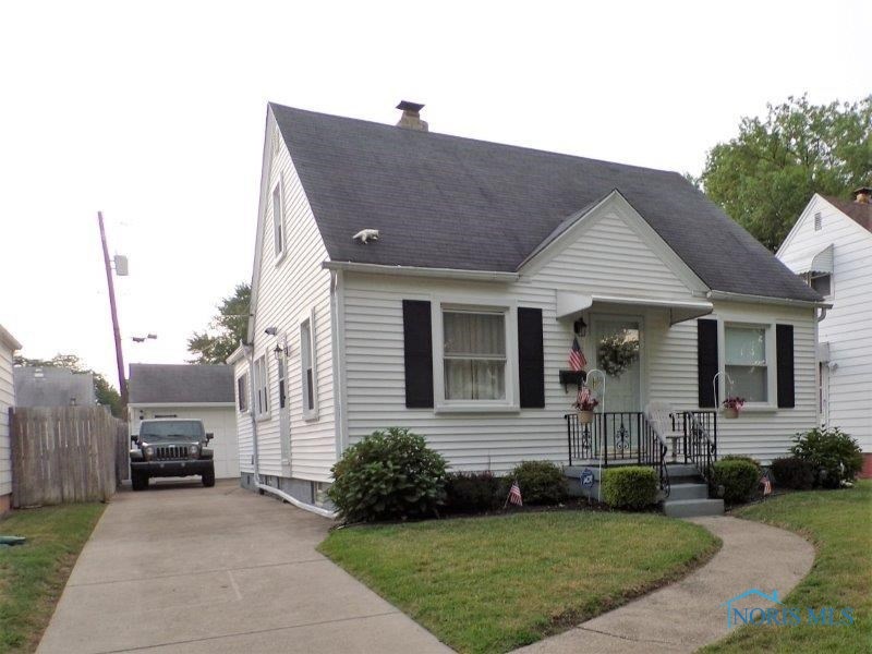 Front Exterior With Detached Garage