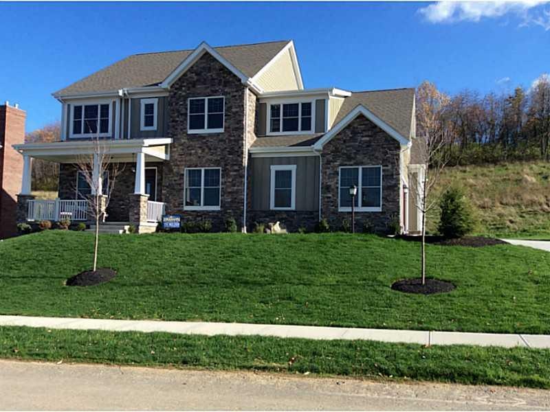 Exterior Front. This Brennan built new home is fab