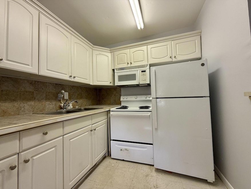 165 Waltham G, West Palm Beach, FL 33417 - photo 1