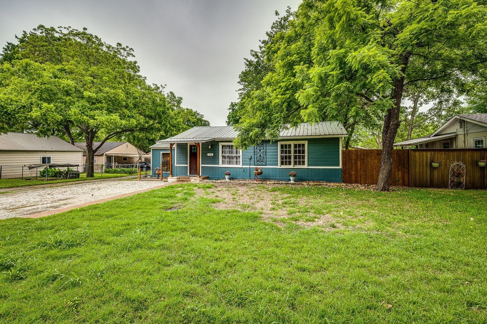 The lovely Cottage, boasting mature trees 3 bedrooms 1 bathroom and a ton of upgrades