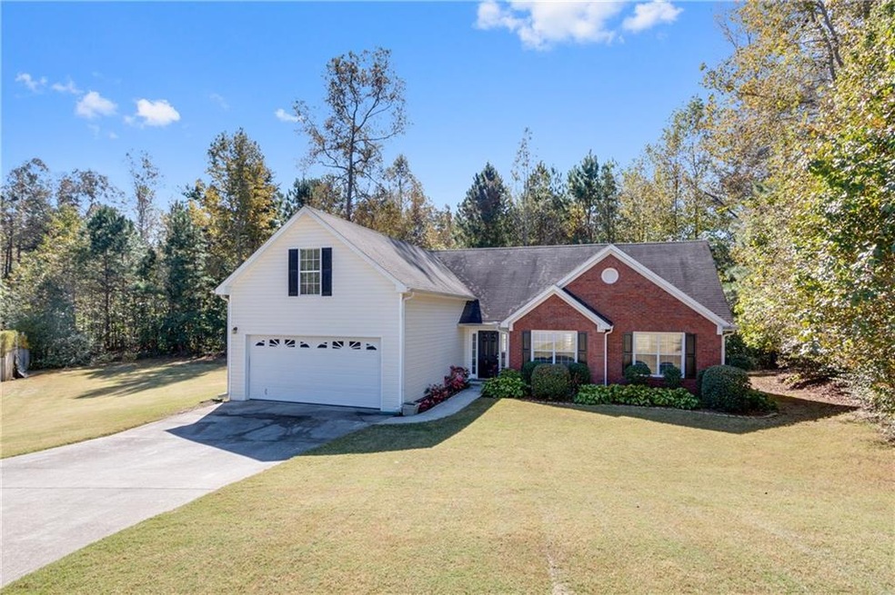 Situated perfectly on a 1 acre cul-de-sac lot, thi