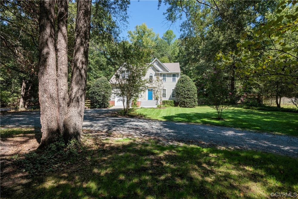 View of FRONT YARD AND DRIVE WAY
