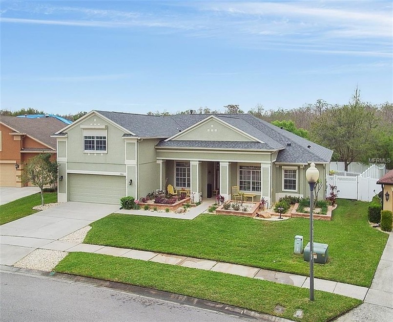 GREAT CURB APPEAL WITH LANDSCAPING COSTING ALMOST 