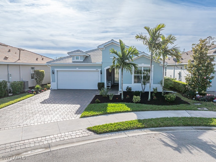 Single story home featuring a garage and cooling u