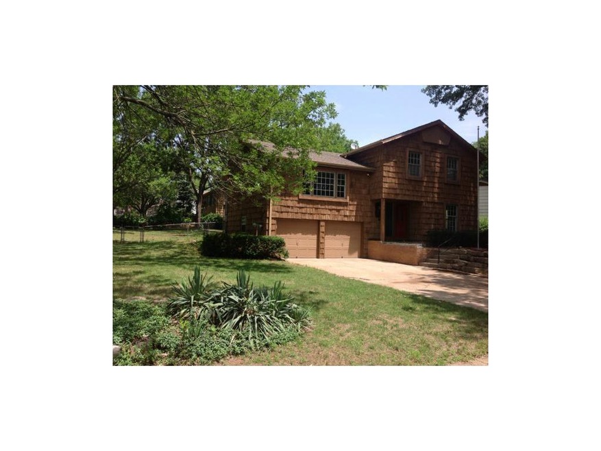 Beautiful corner fenced lot, cedar shingle siding