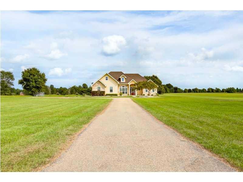 Facade/Exterior Front. Beautiful home on 2.3 acres