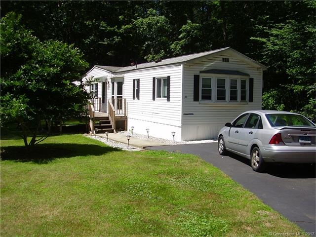 Exterior front with paved driveway