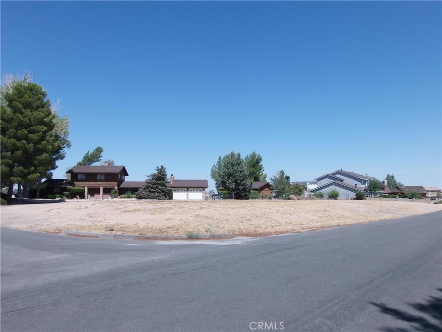 Corner Lot on a cul de sac to the left.  The road to the right is a dead end so your street is less traveled.
