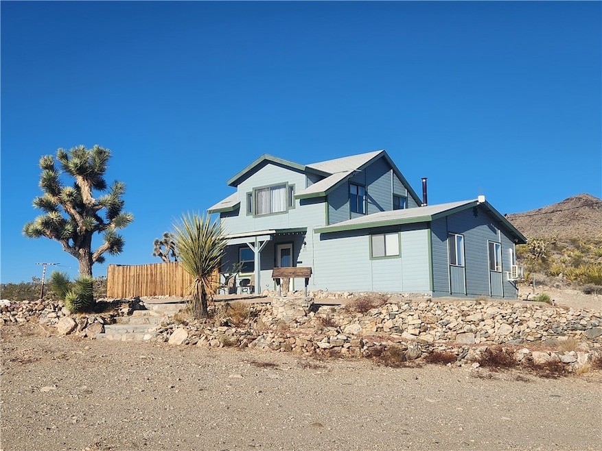 View of front of house with a mountain view
