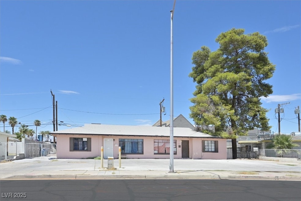 Ranch-style house with stucco siding
