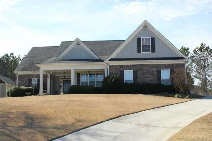 Exterior Front. Sodded Yard.