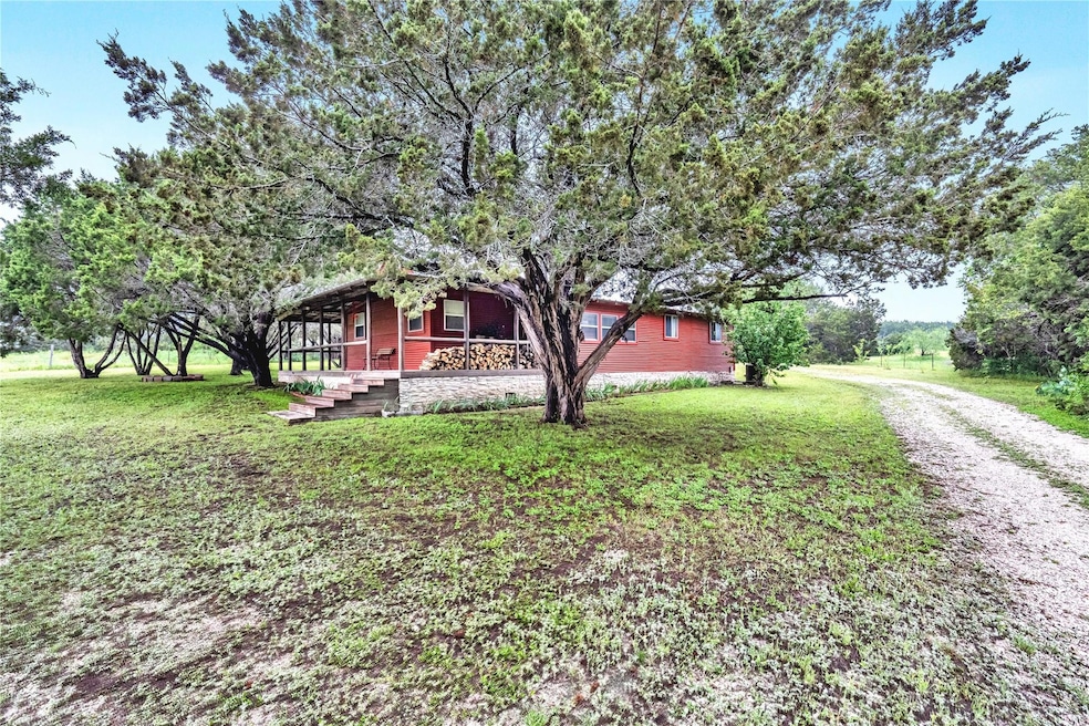 View of front of property with a front yard