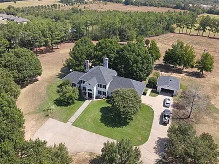 Beautiful 18.22-acre estate featuring main home, p