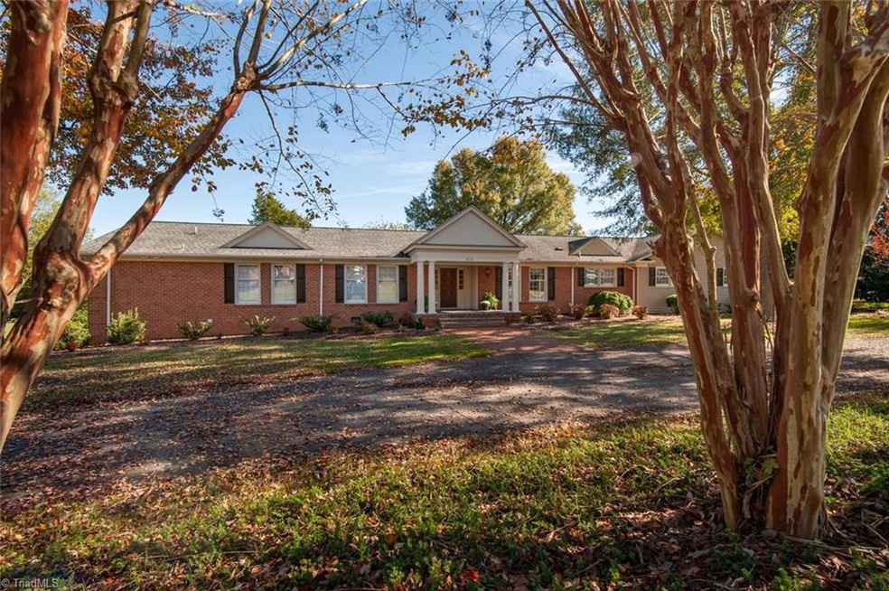 One of the First custom homes built at Willow Creek Subdivision.  Note the circular drive....