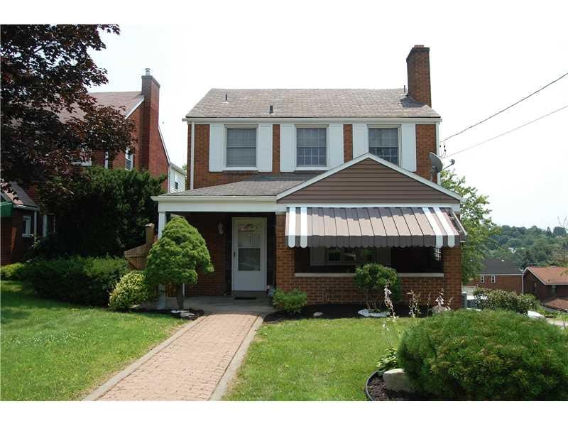 Exterior Front. Cozy front porch is a perfect spot