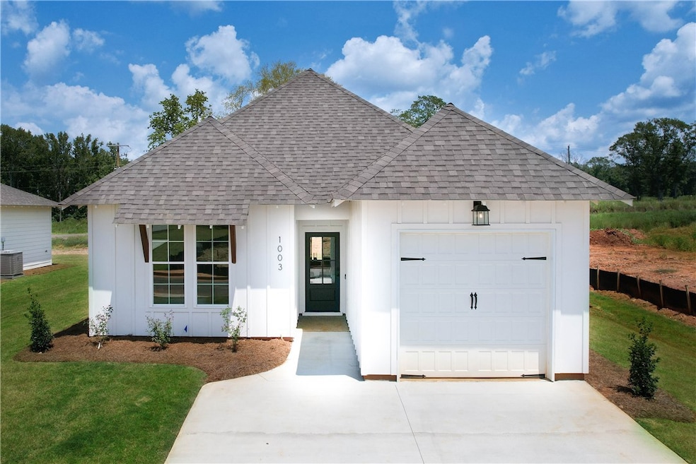 Street view of front of home - 1 car garage