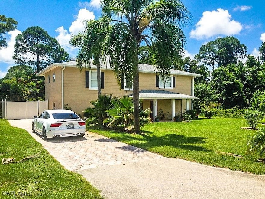 View of front facade featuring driveway