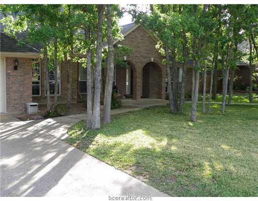Exterior Front. Shaded front entry