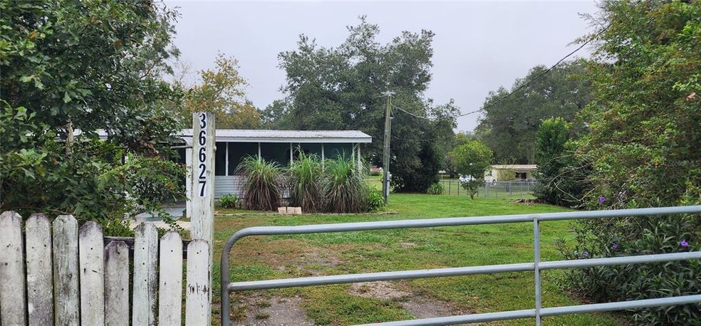 36627 Sunshine Rd, Zephyrhills, FL 33541 - photo 1
