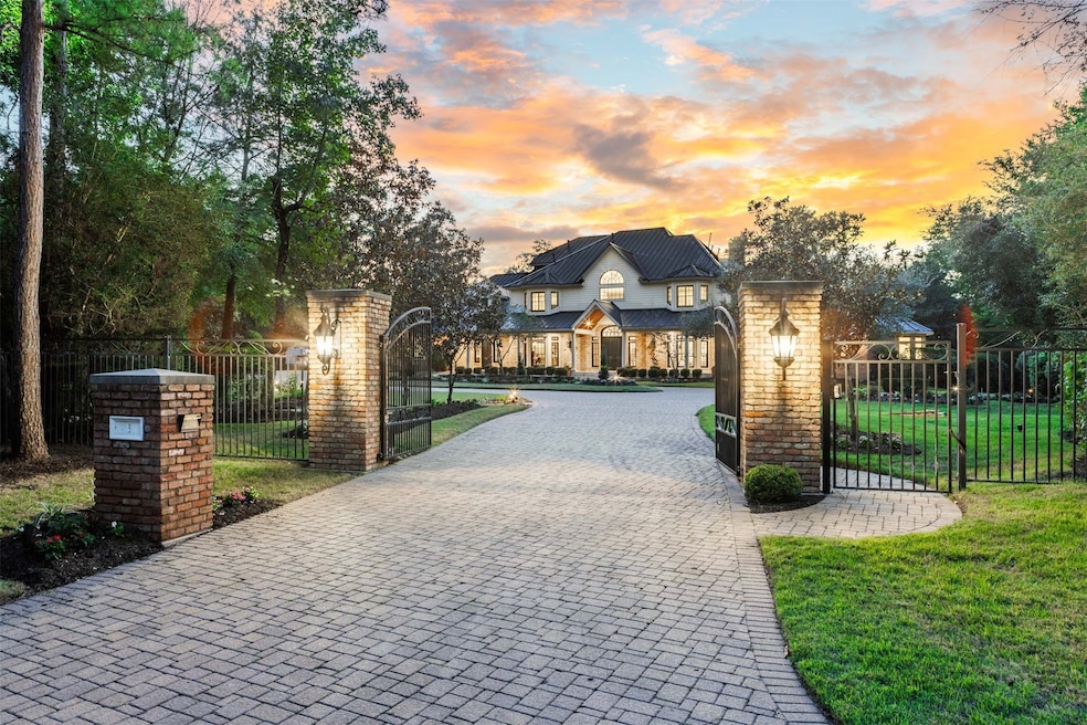 Privately nestled among mature trees on a sprawlin