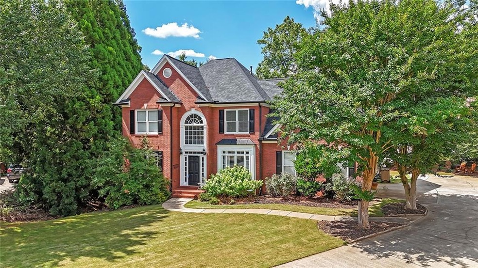View of front of property with a front yard