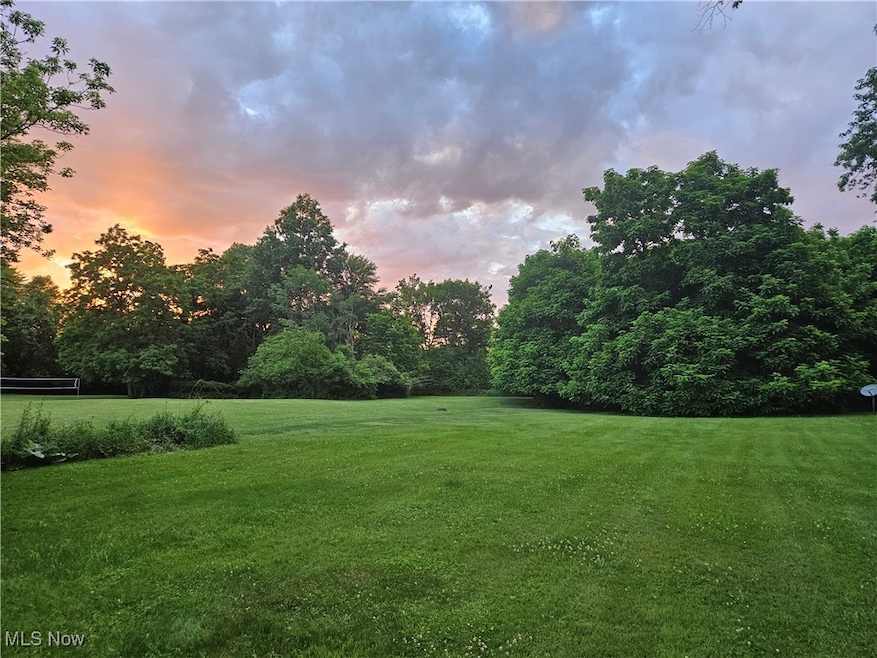 View of yard at dusk looking north