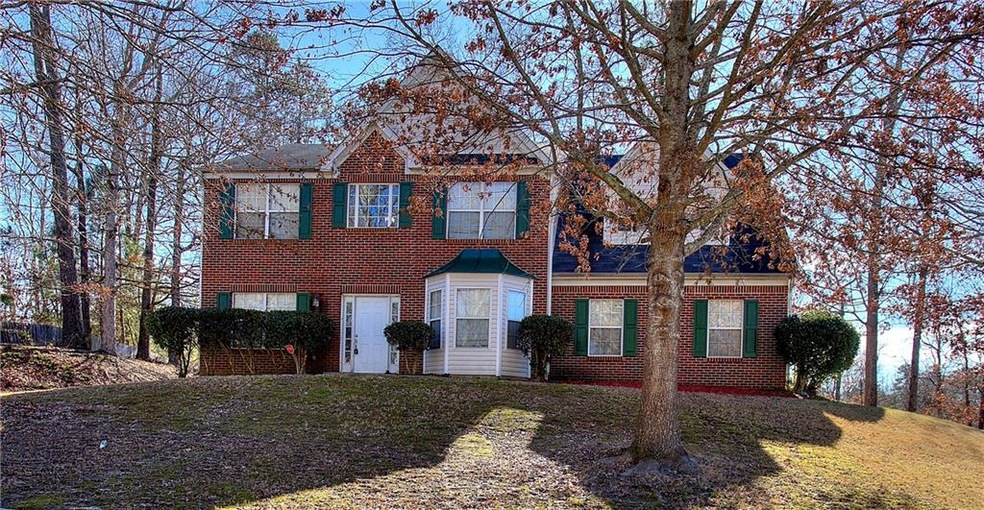 View of front of property with a front yard
